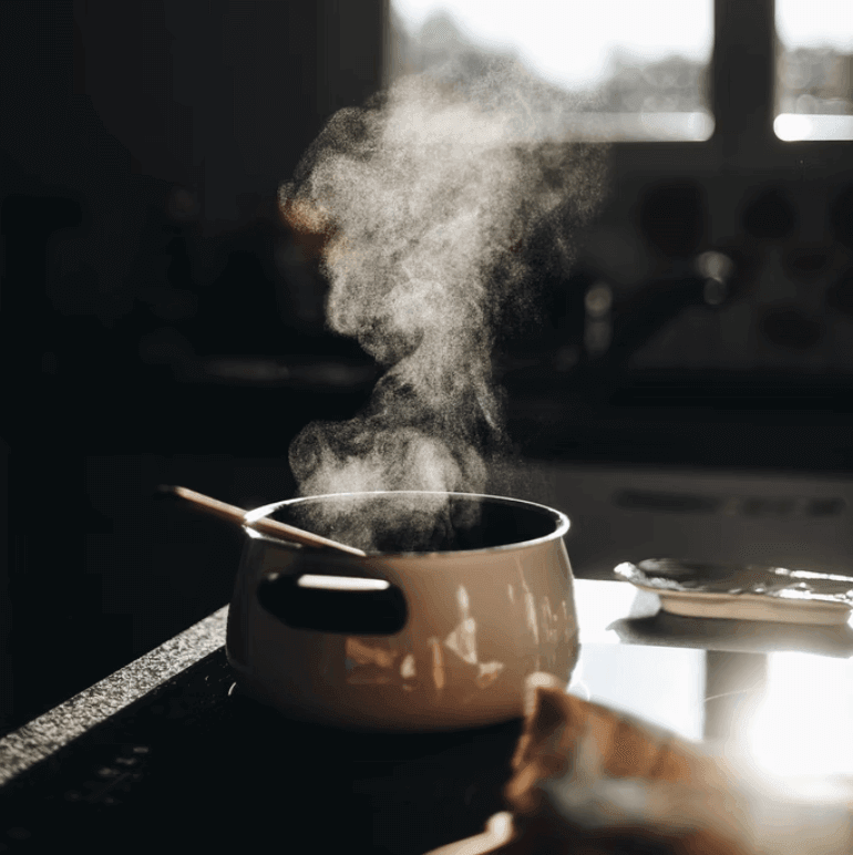 Steaming pan on a stove