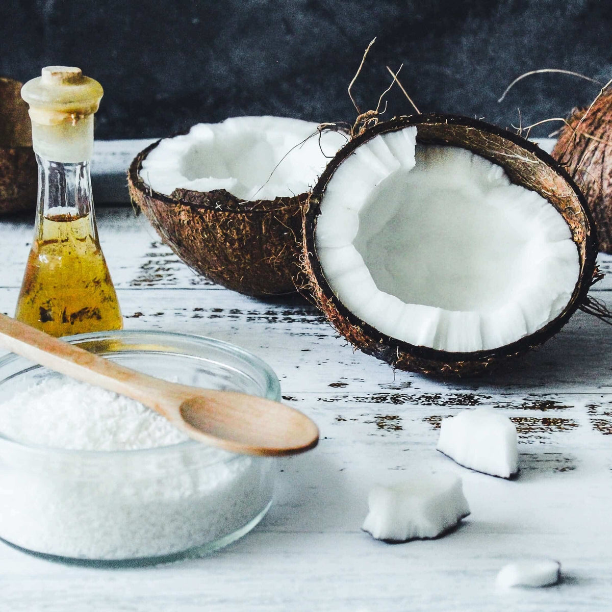 Coconut halves with coconut oil and salt