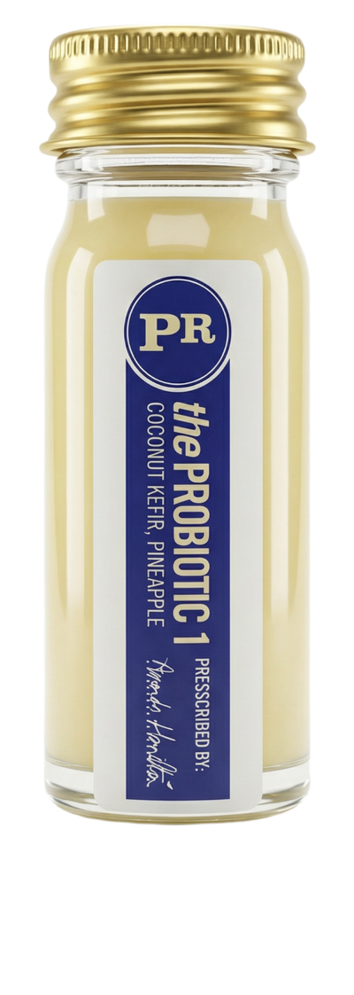 The Probiotic 1, a creamy probiotic shot in a small Presscription glass bottle