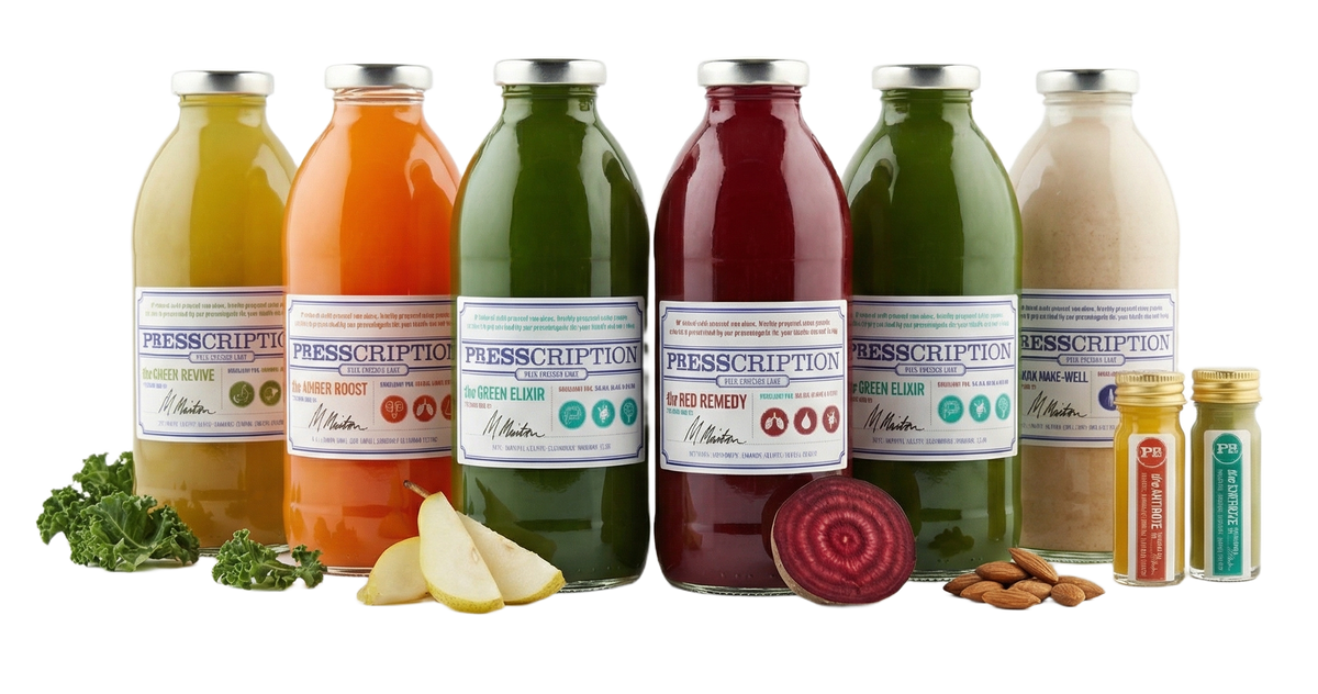 Intermediate Juice Cleanse: a row of Presscription cold pressed juices and wellness shots with fresh vegetables